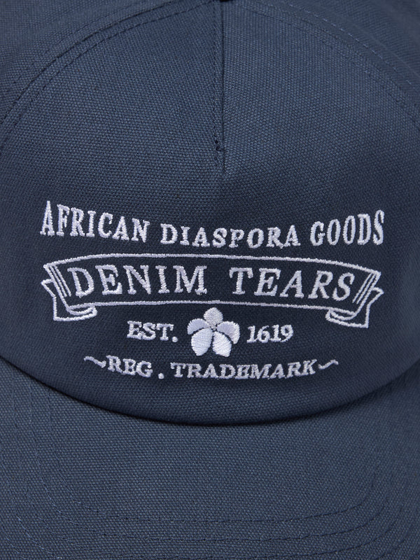 DENIM TEARS - Adg Stamp Cap - (Navy)