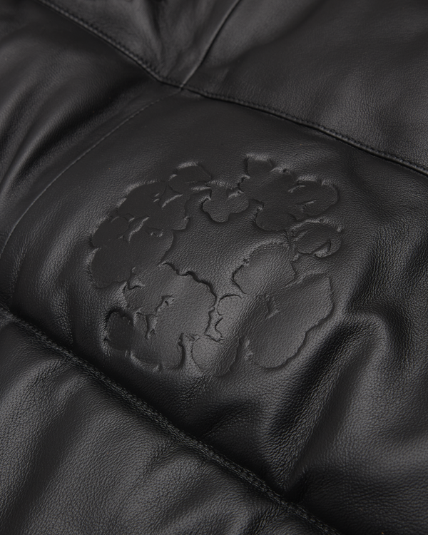 DENIM TEARS - Embossed Leather Wreath Puffer Jacket - (Black)