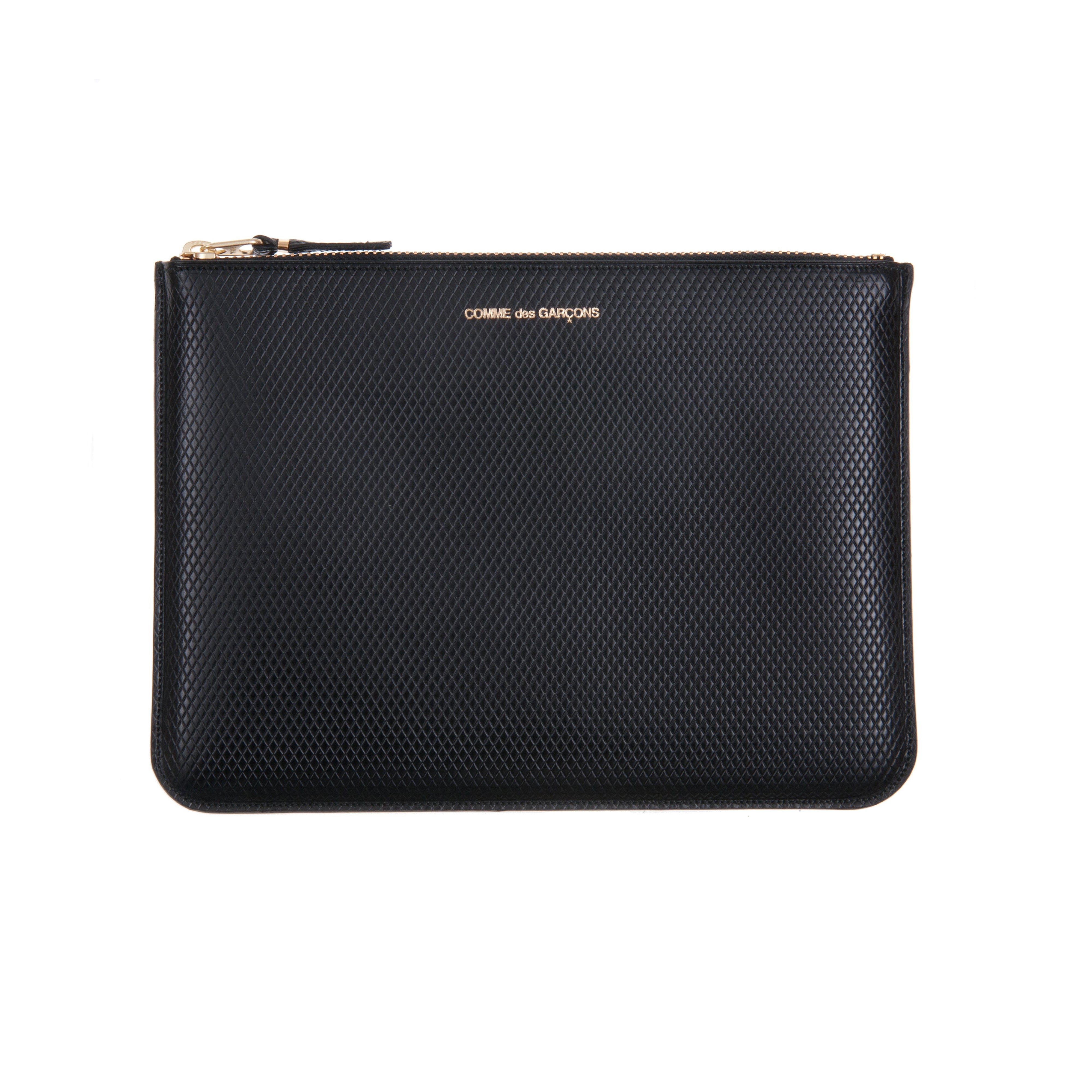 Comme des garcons shop wallet luxury group